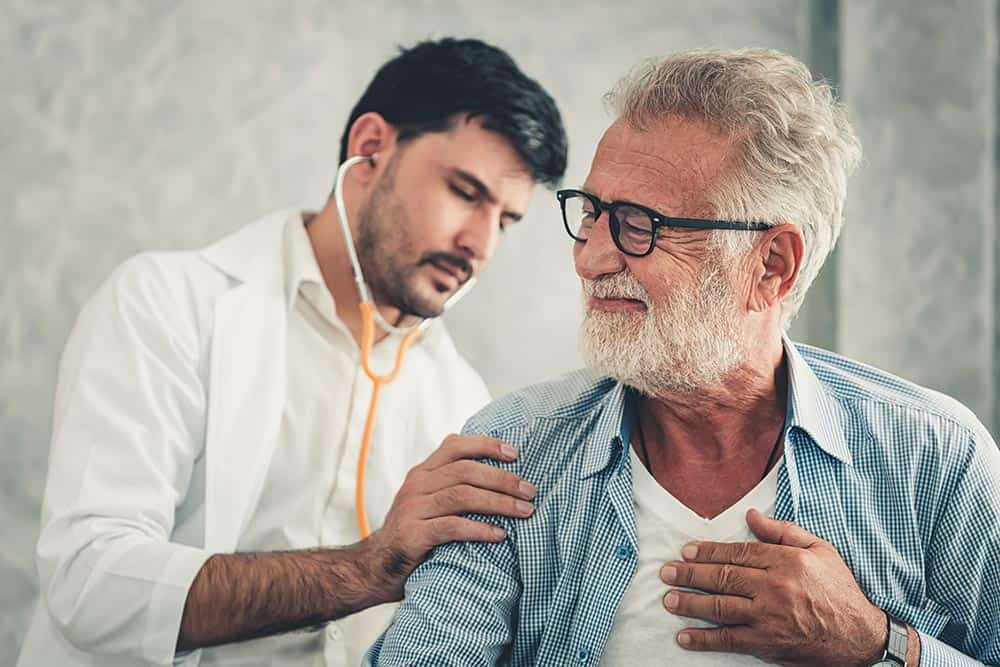 Doctor Listening to Patients Breathing
