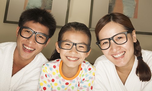 Asian Family Smiling with Glasses